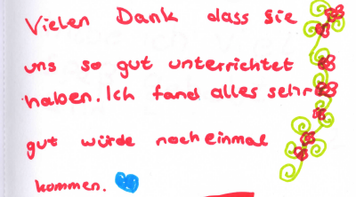 Bild eines handgeschriebenen Notizzettels mit Kinderschrift